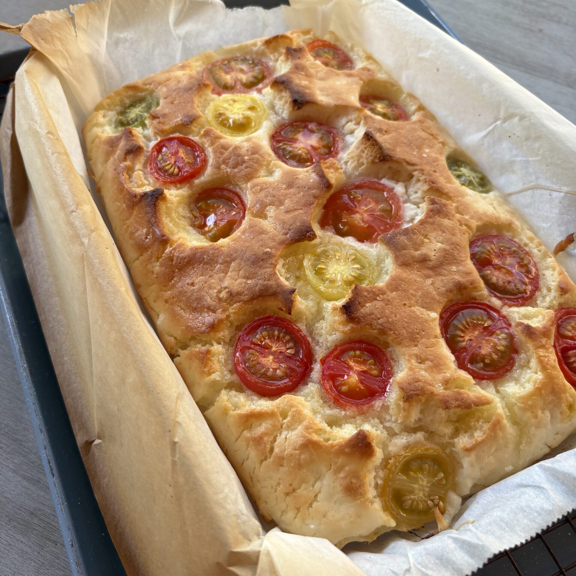 Raw rice focaccia with cherry tomatoes